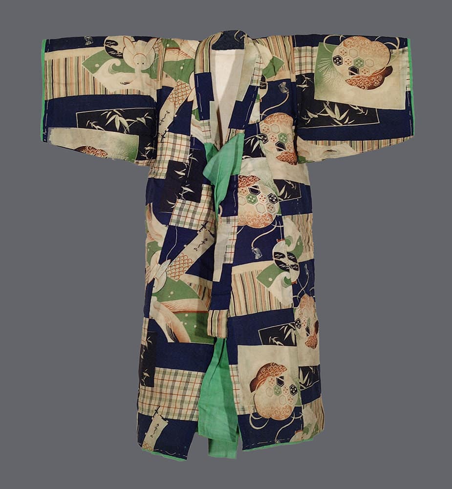 Vintage Japanese patchwork kimono with geometric patterns and nature motifs
