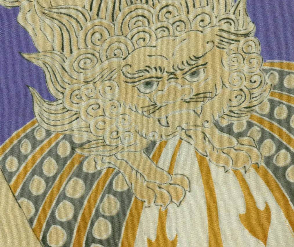 Stylized mythical creature with curly patterns on yellow and purple textile