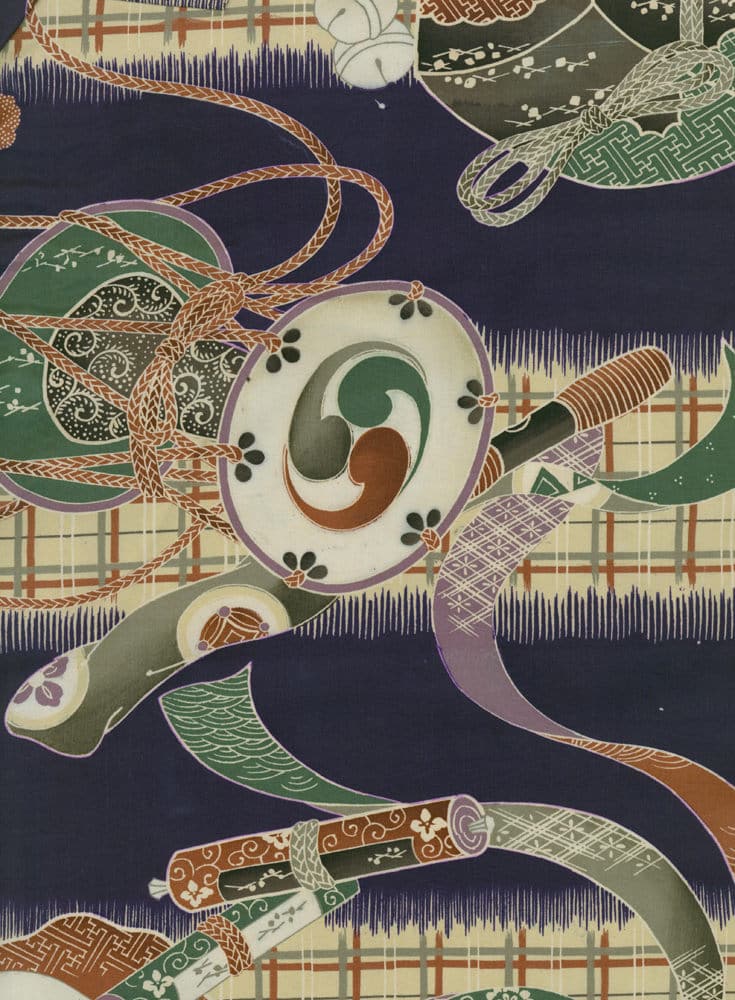 Ornate Japanese textile with curving patterns, ropes, and geometric designs