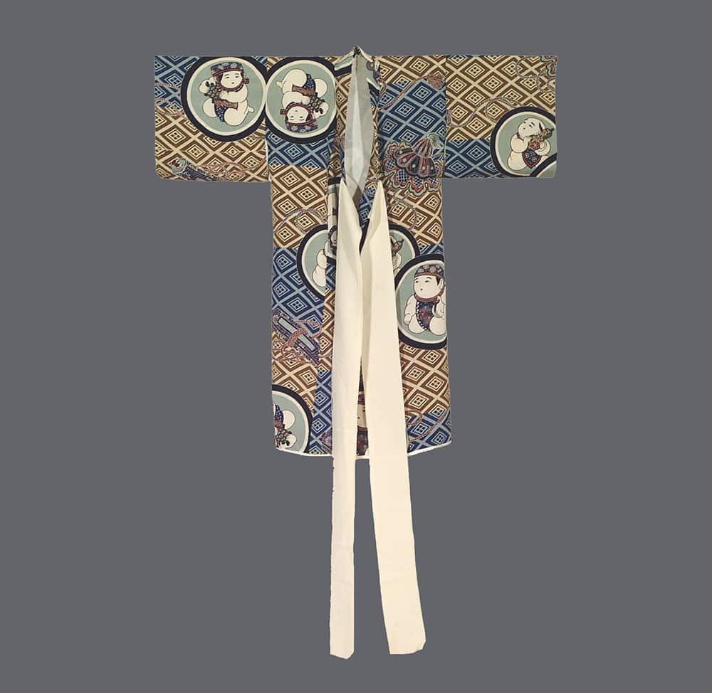 Traditional Japanese kimono with geometric patterns and circular character motifs