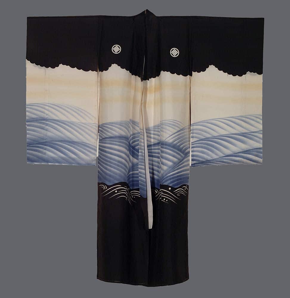 Traditional black and blue Japanese kimono with wave-like landscape design