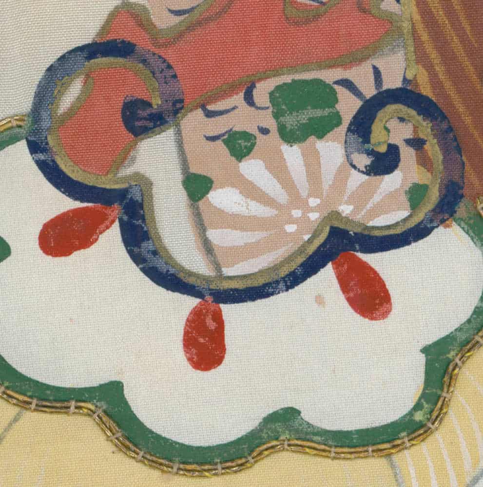 Decorative flower motif with curving blue borders and red teardrop shapes