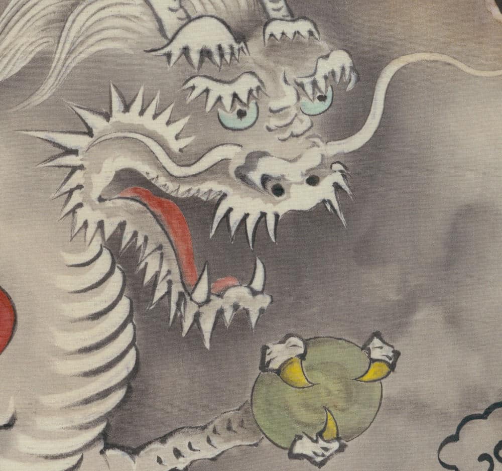 Japanese dragon looming over small creature in traditional ink painting
