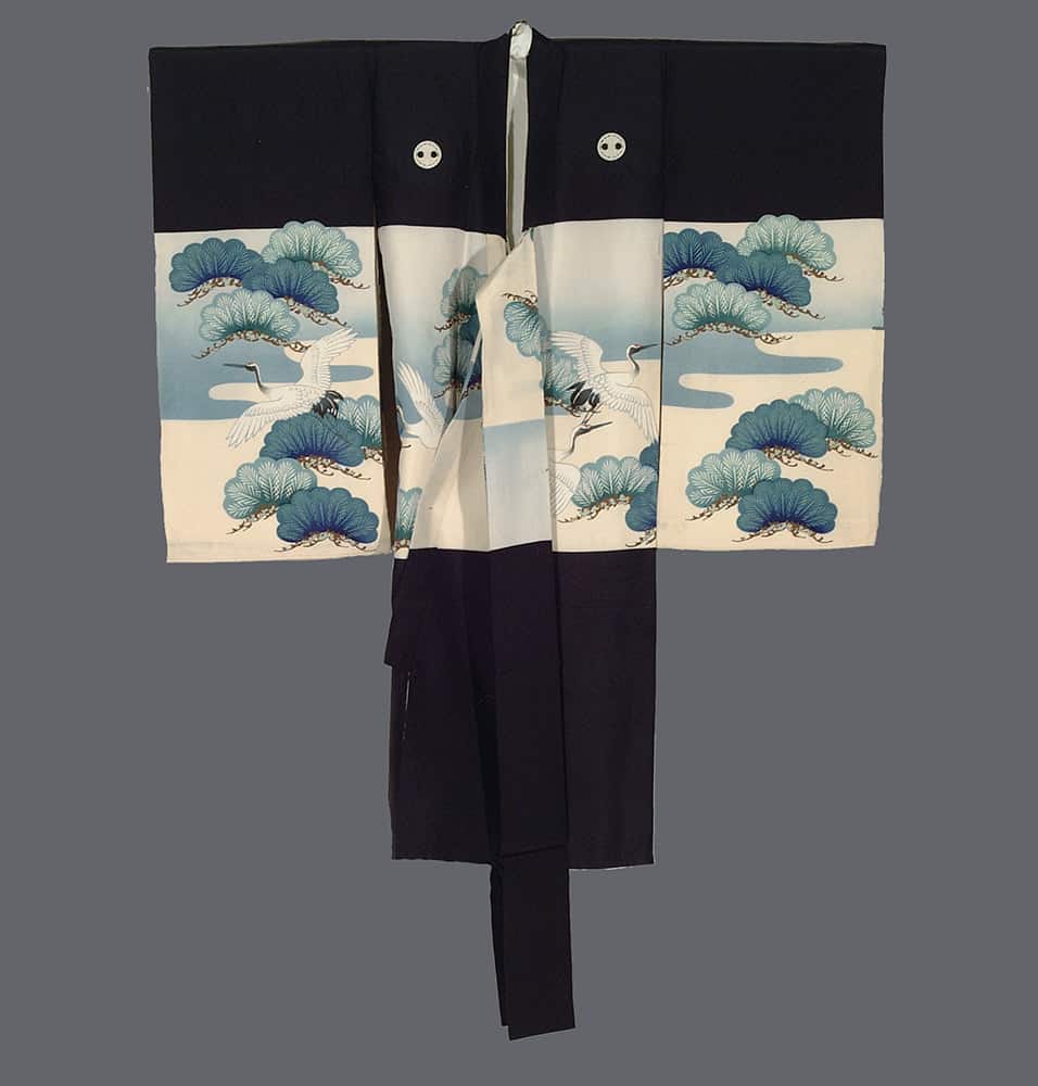 Black and white kimono with blue pine trees and white crane design