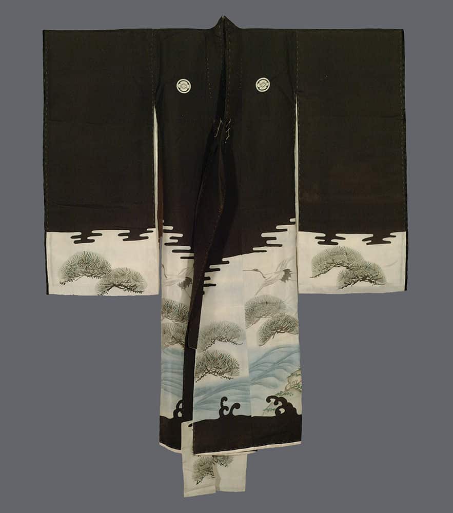 Traditional black and white Japanese kimono with pine trees and waves