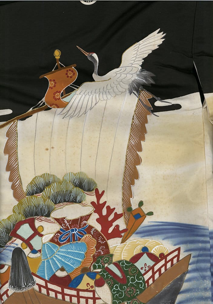 White crane flying over traditional Japanese boat with colorful decorative elements