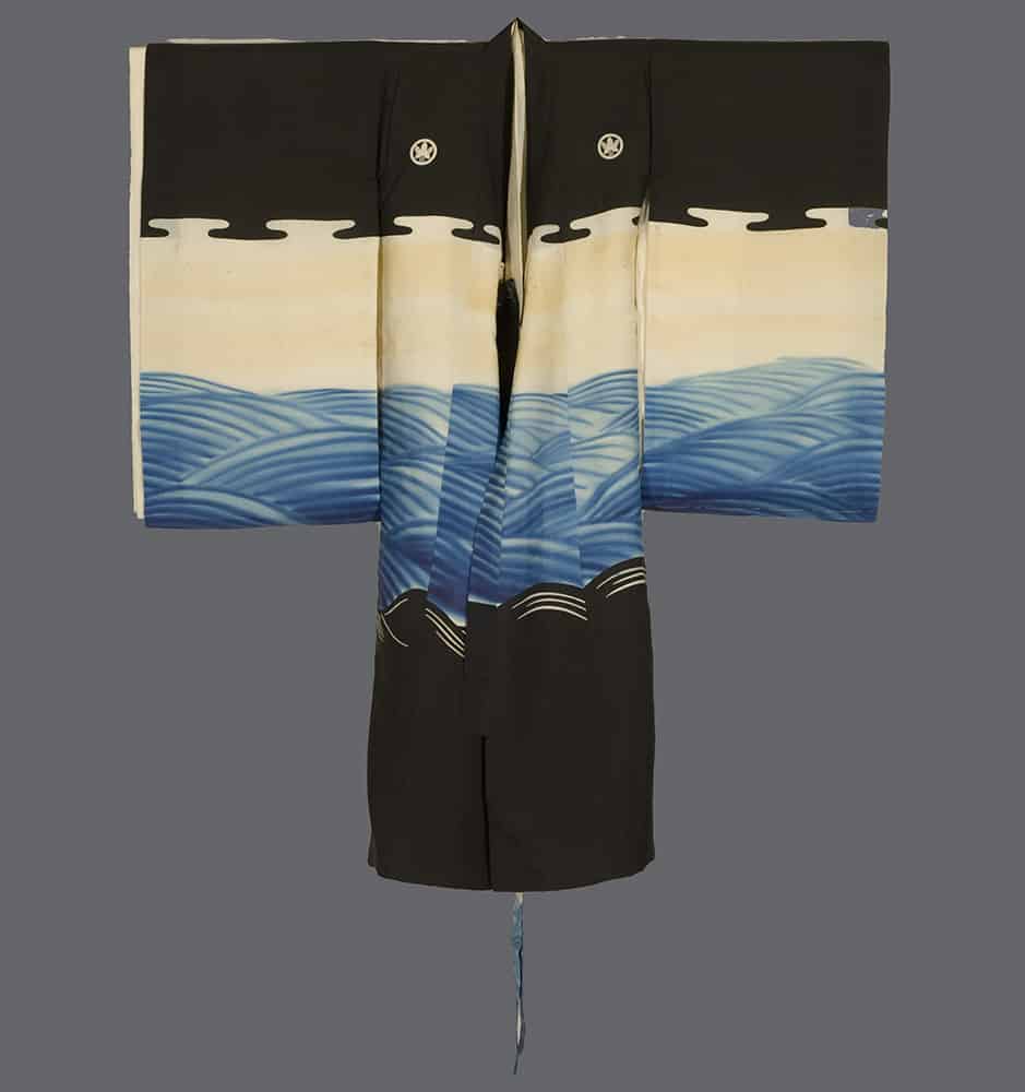 Traditional Japanese kimono with blue wave pattern and black panels