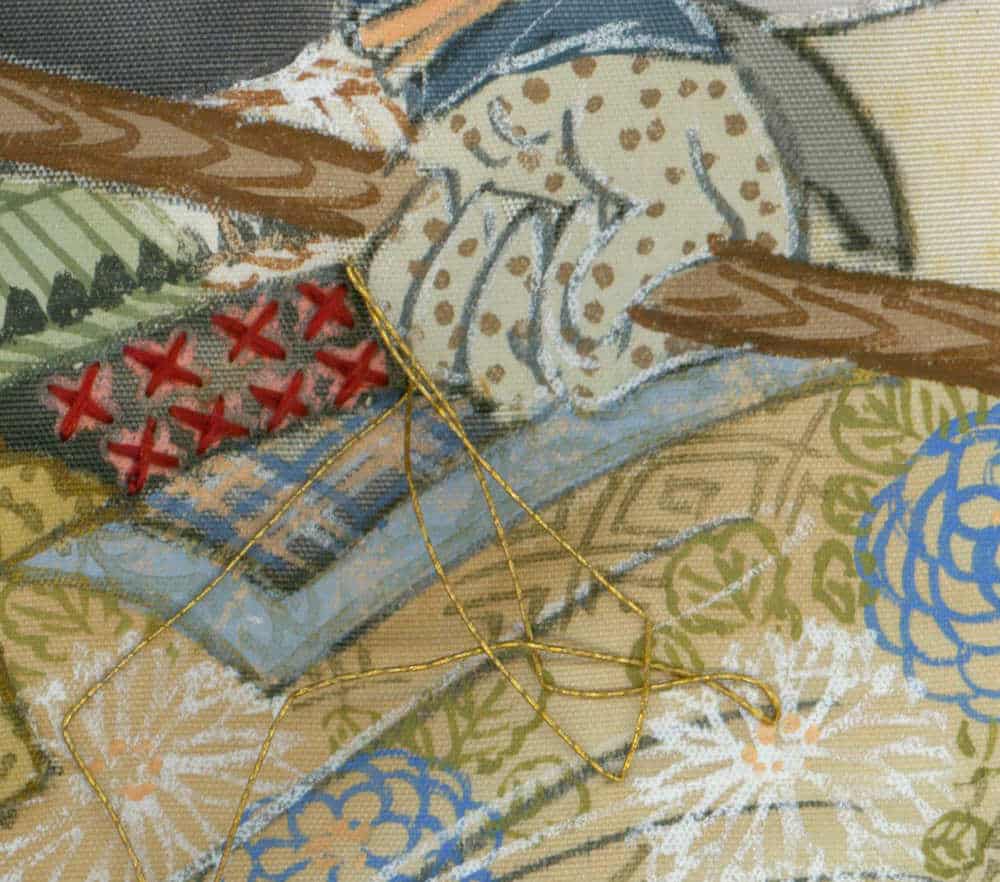 Detailed textile artwork with floral patterns, cross-stitch, and golden threads