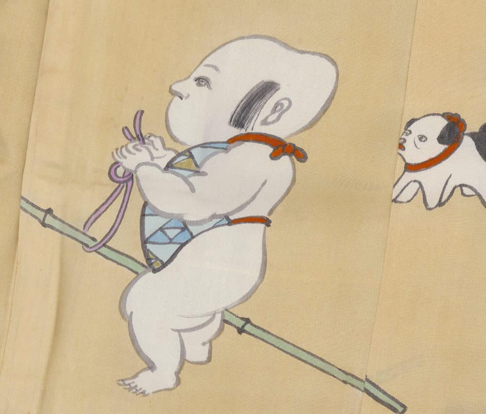 Traditional Japanese illustration of baby holding staff and rope
