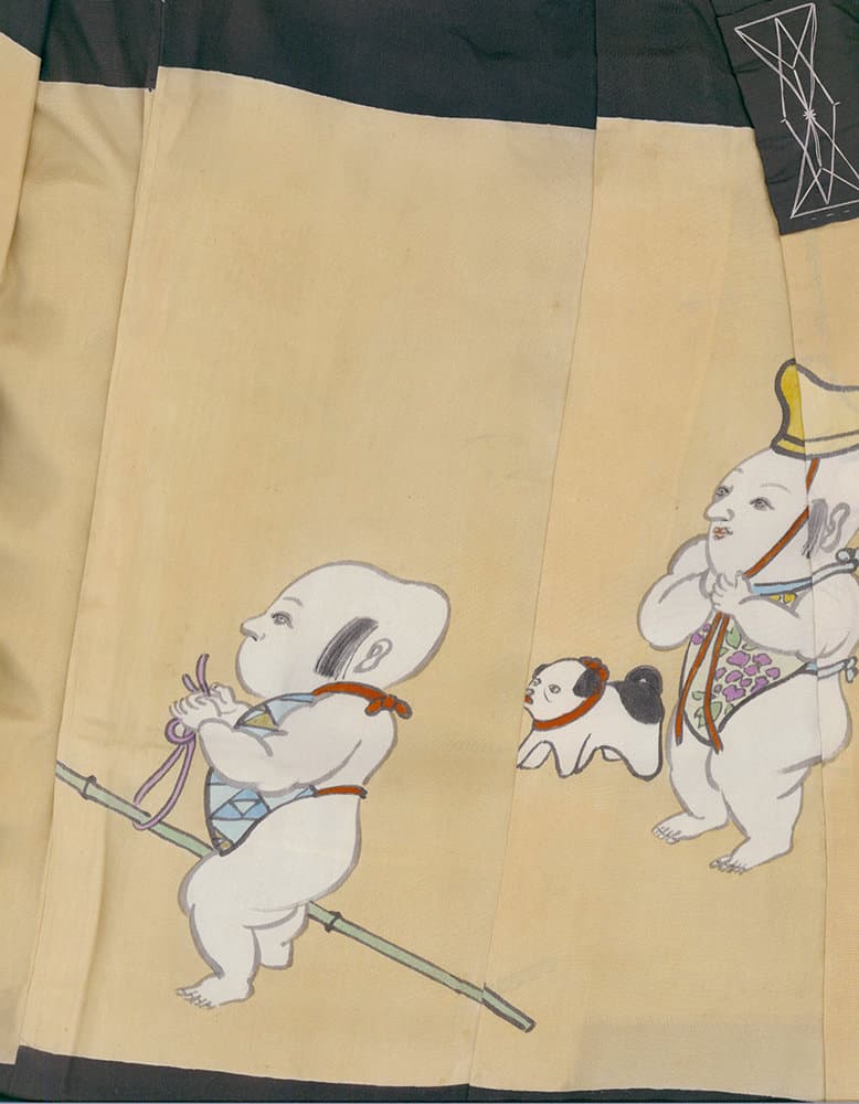 Traditional Japanese art of playful baby-like figures with a stick