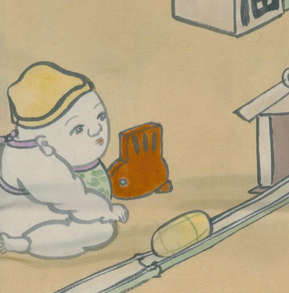 Baby watching orange fish swim by on conveyor belt