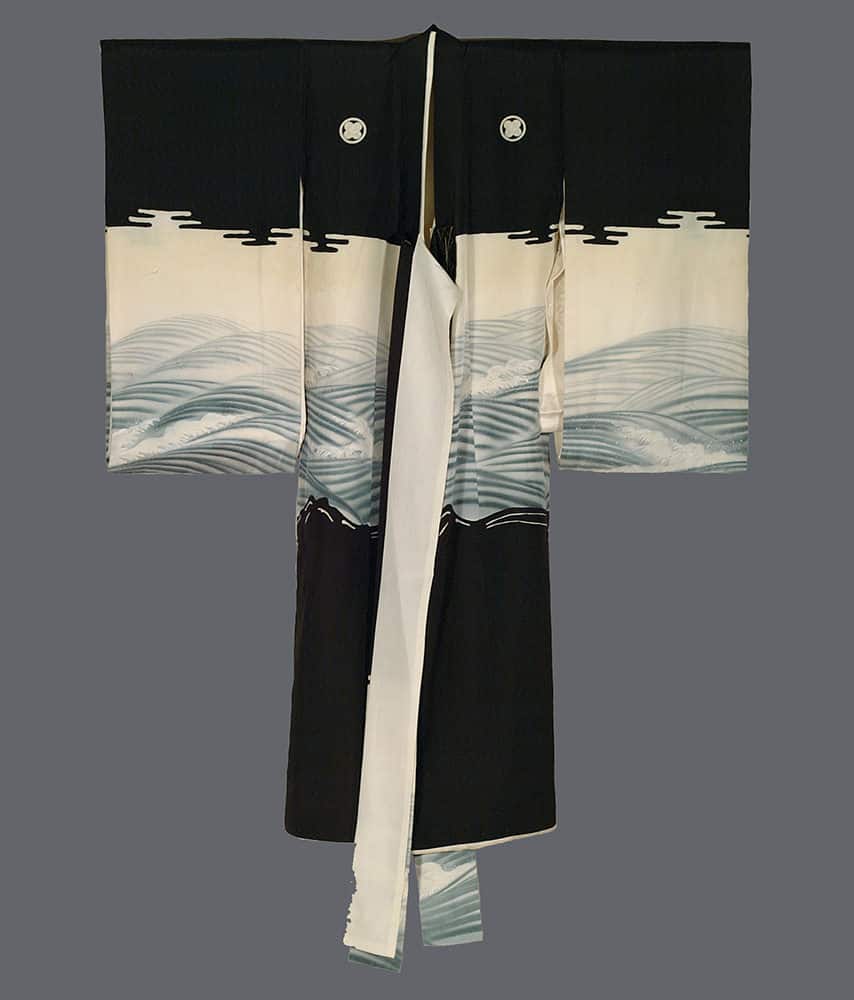 Traditional Japanese black and white kimono with wave pattern design
