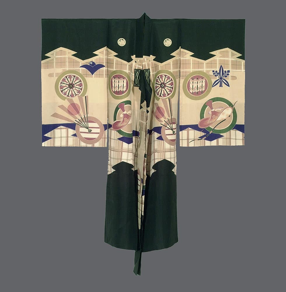 Traditional Japanese kimono with geometric patterns and fans on green background