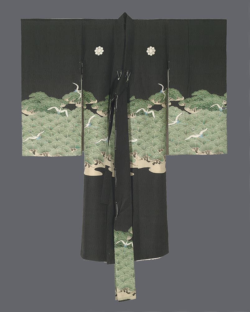Traditional black Japanese kimono with green pine trees and white crane design