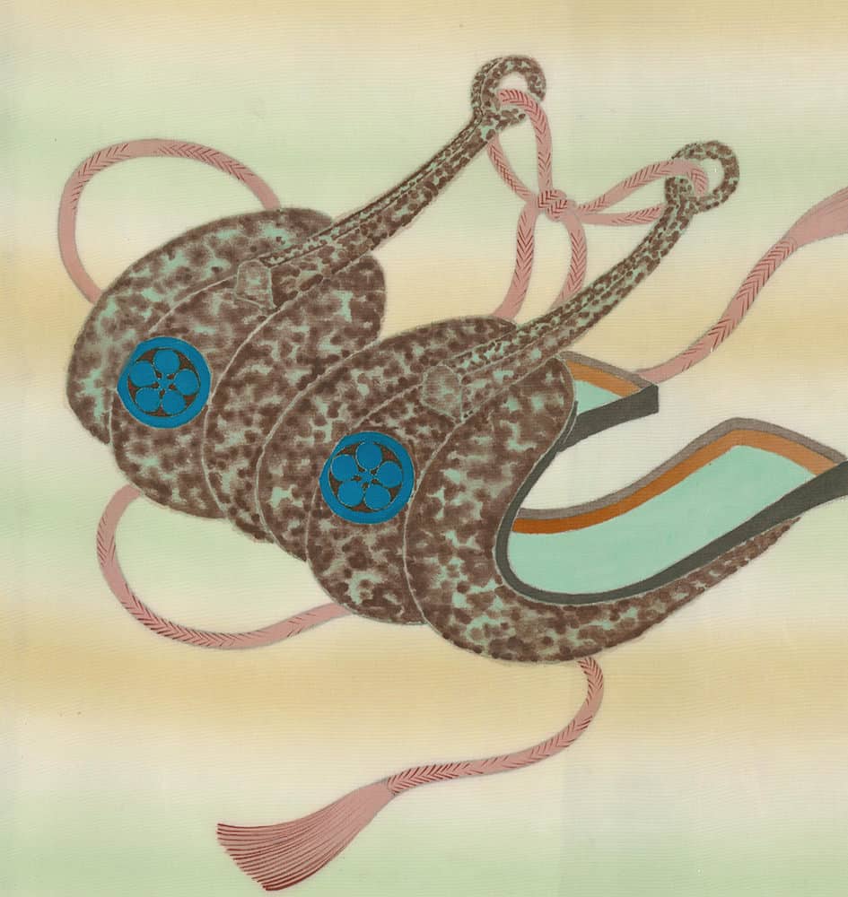 Stylized octopus with blue circular patterns and pink ribbons on pastel background