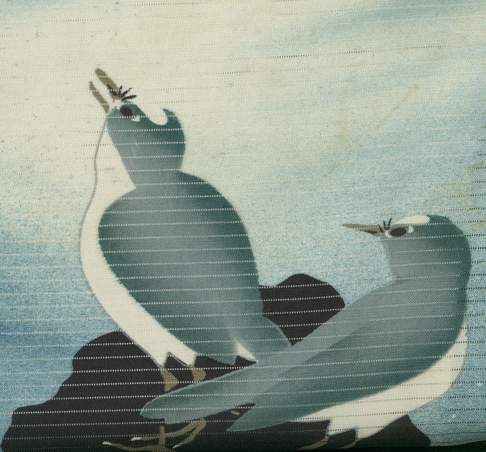 Two stylized sea birds against a muted blue textured background