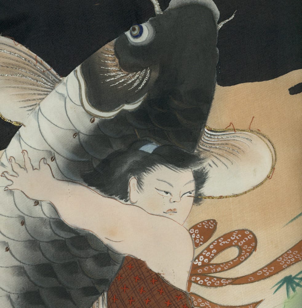 Japanese artwork of woman with large black and white fish