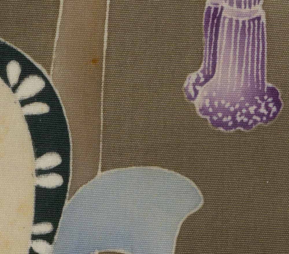 Abstract fabric with purple textured shapes and muted colors