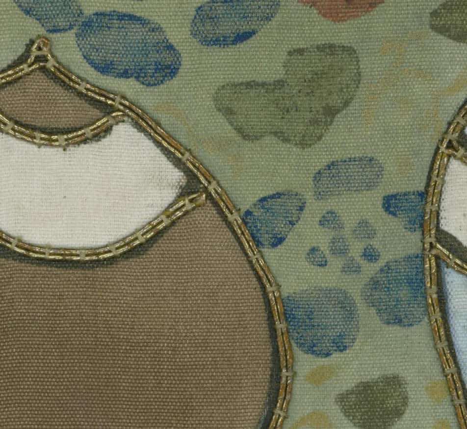 Decorative fabric with overlapping circles and blue-green leaf pattern