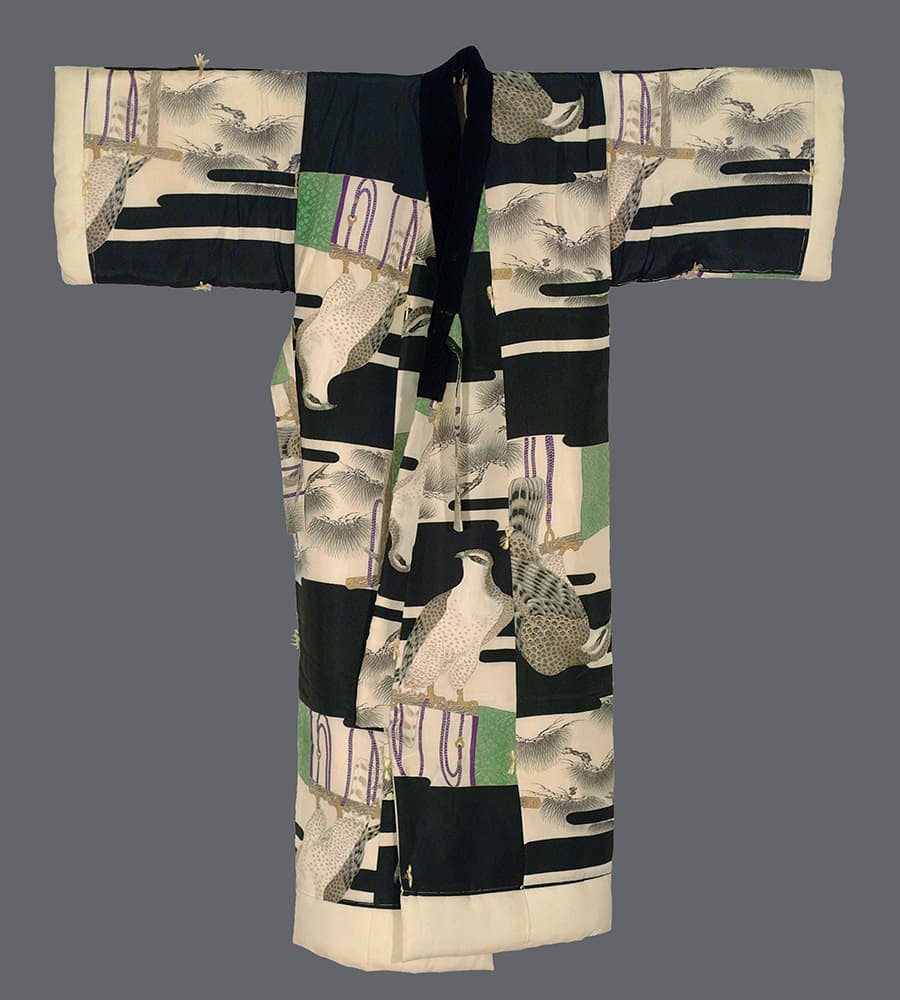 Traditional Japanese kimono with bird and pine tree patchwork design