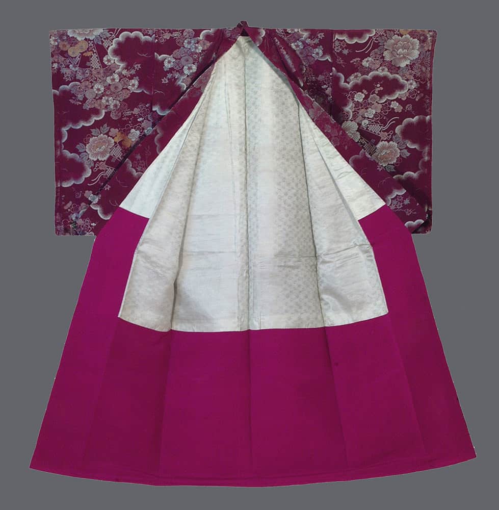 Traditional white and magenta Korean hanbok with floral brocade sleeves