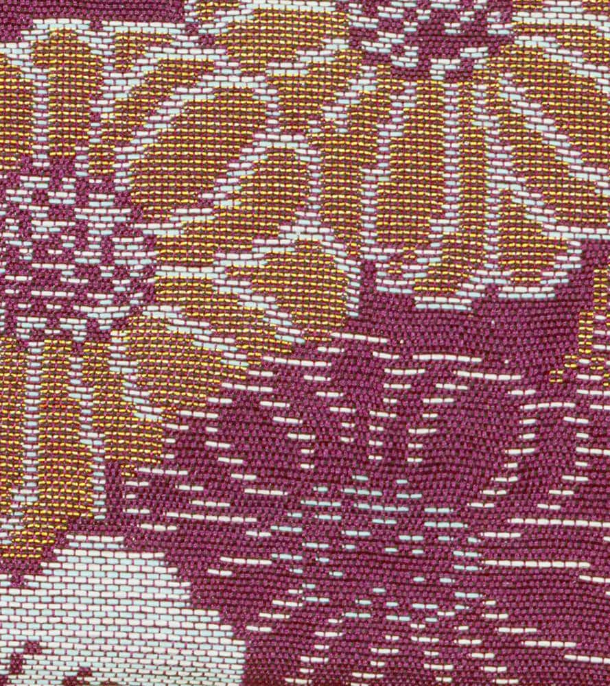 Woven textile with burgundy, gold, and white geometric pattern
