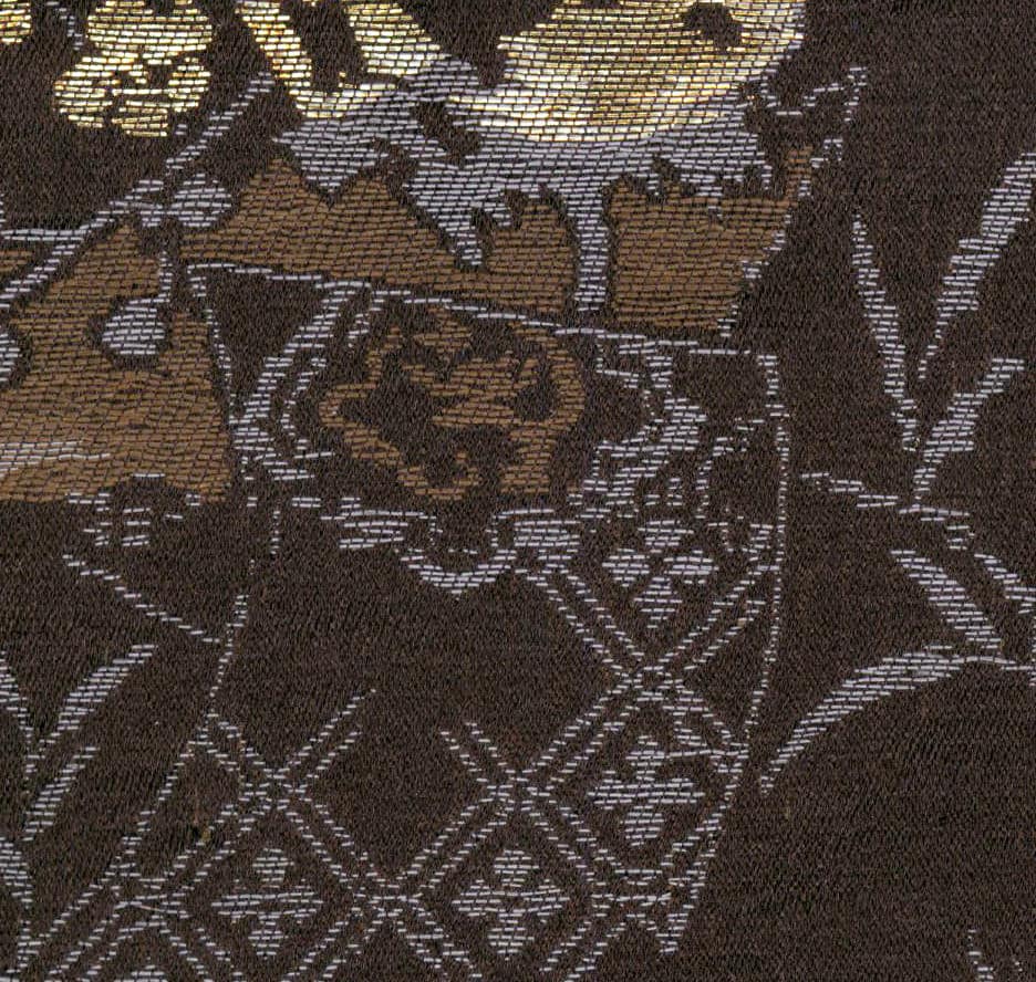 Intricate woven textile with metallic gold and brown floral pattern