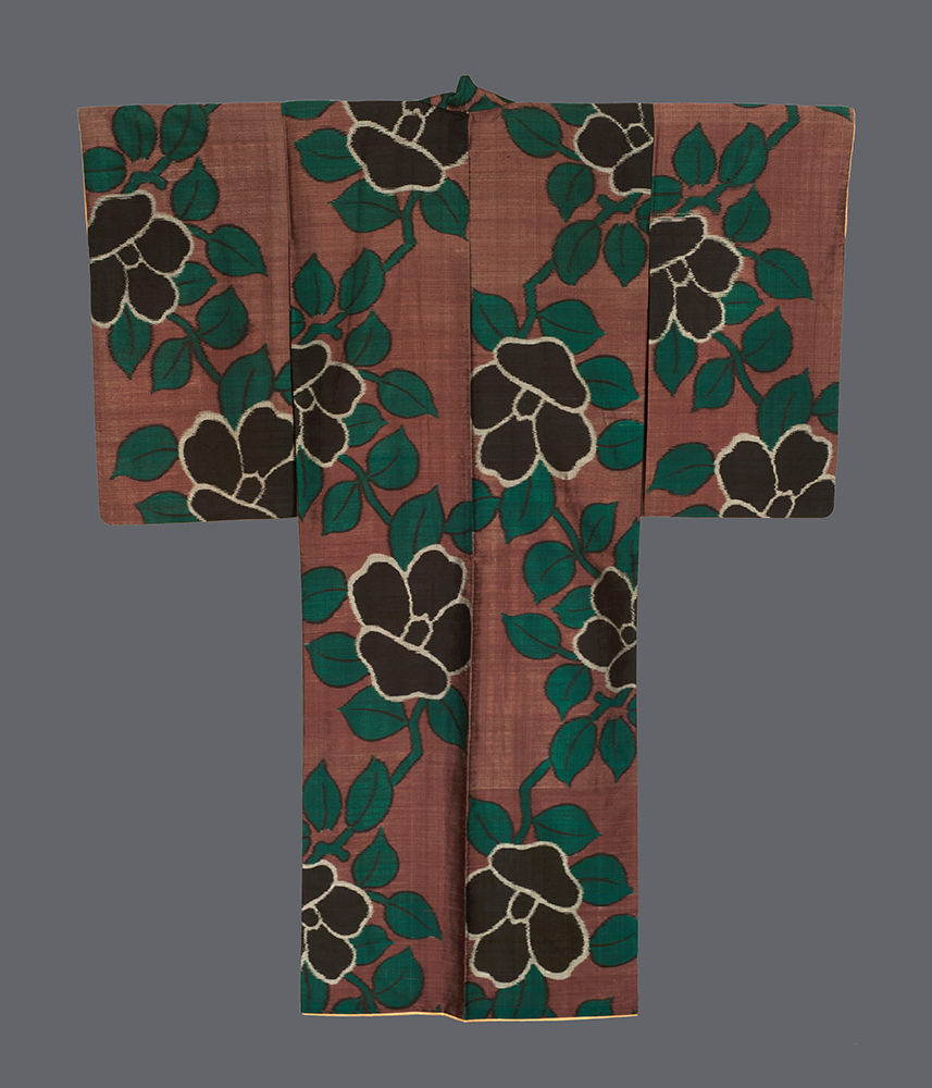 Traditional Japanese kimono with green and black floral pattern