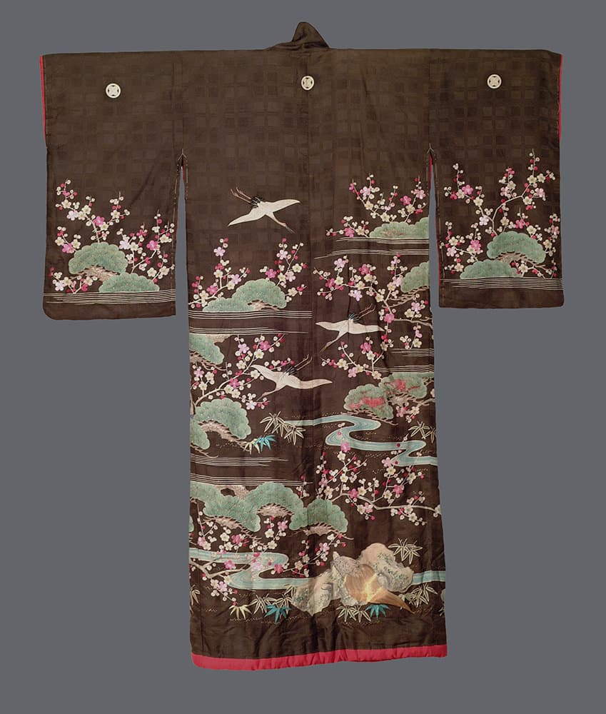 Traditional Japanese kimono with cherry blossoms, cranes, and pine trees