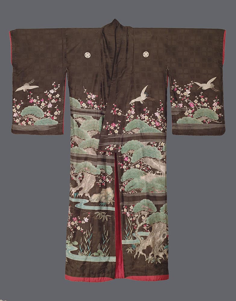 Elegant Japanese kimono with birds, trees, and cherry blossoms
