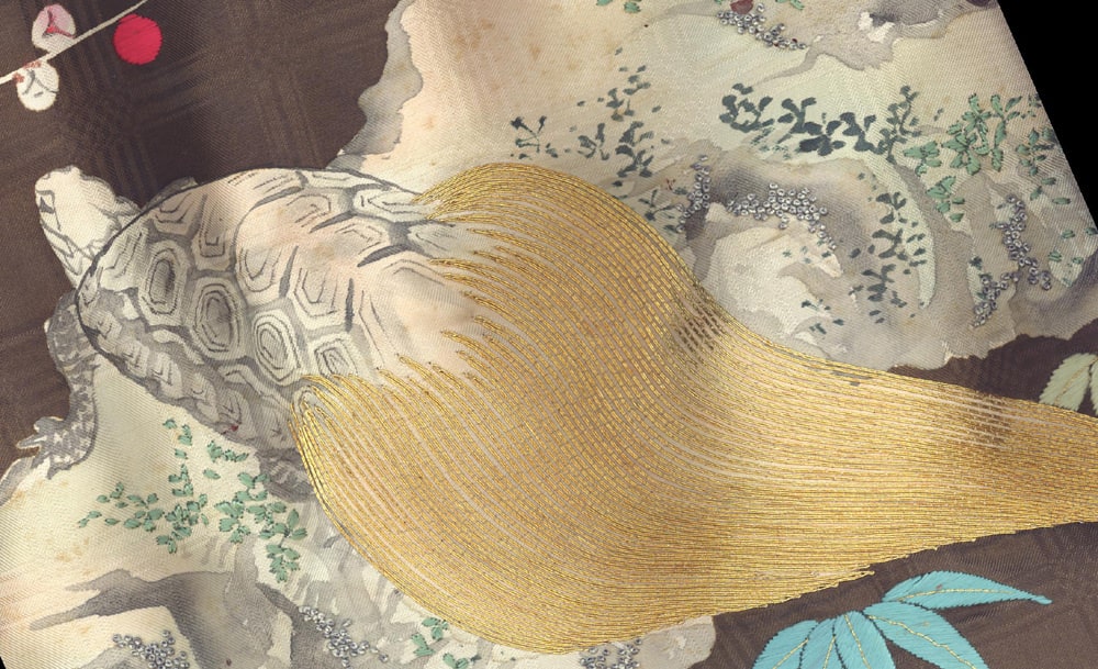 Vintage Japanese art print of a turtle with golden flowing tail