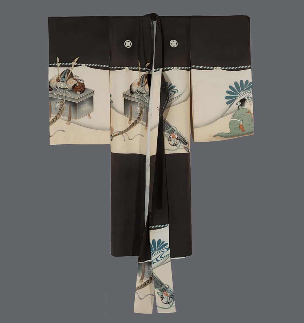 Traditional Japanese black and white kimono with decorative samurai and floral design