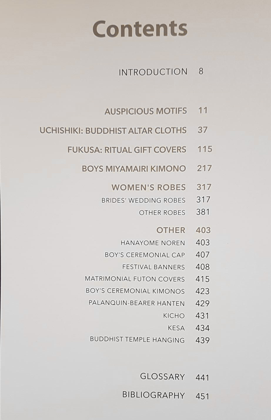 Book contents page listing chapters about Japanese textiles and cultural artifacts