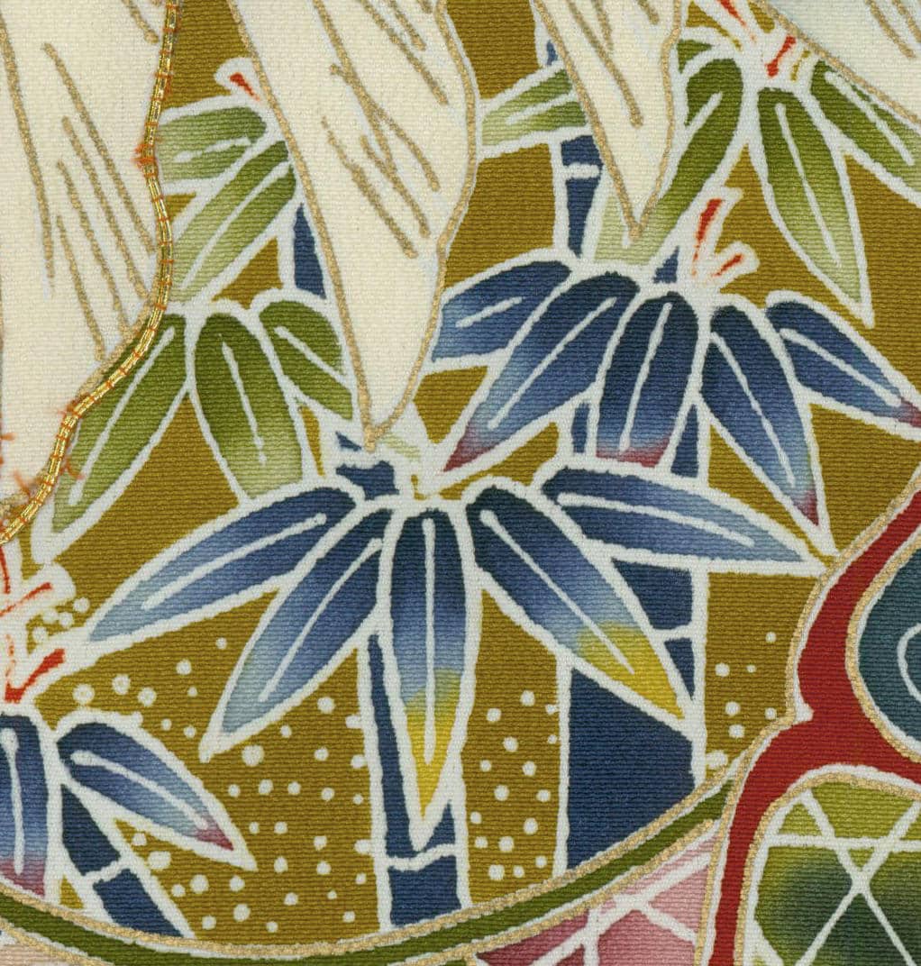 Geometric floral pattern in blue, green, and gold textile design