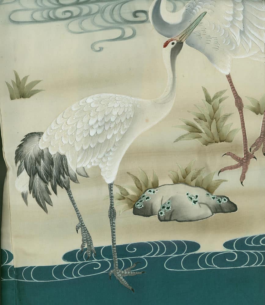 White crane standing near rocks and water in delicate Japanese-style illustration