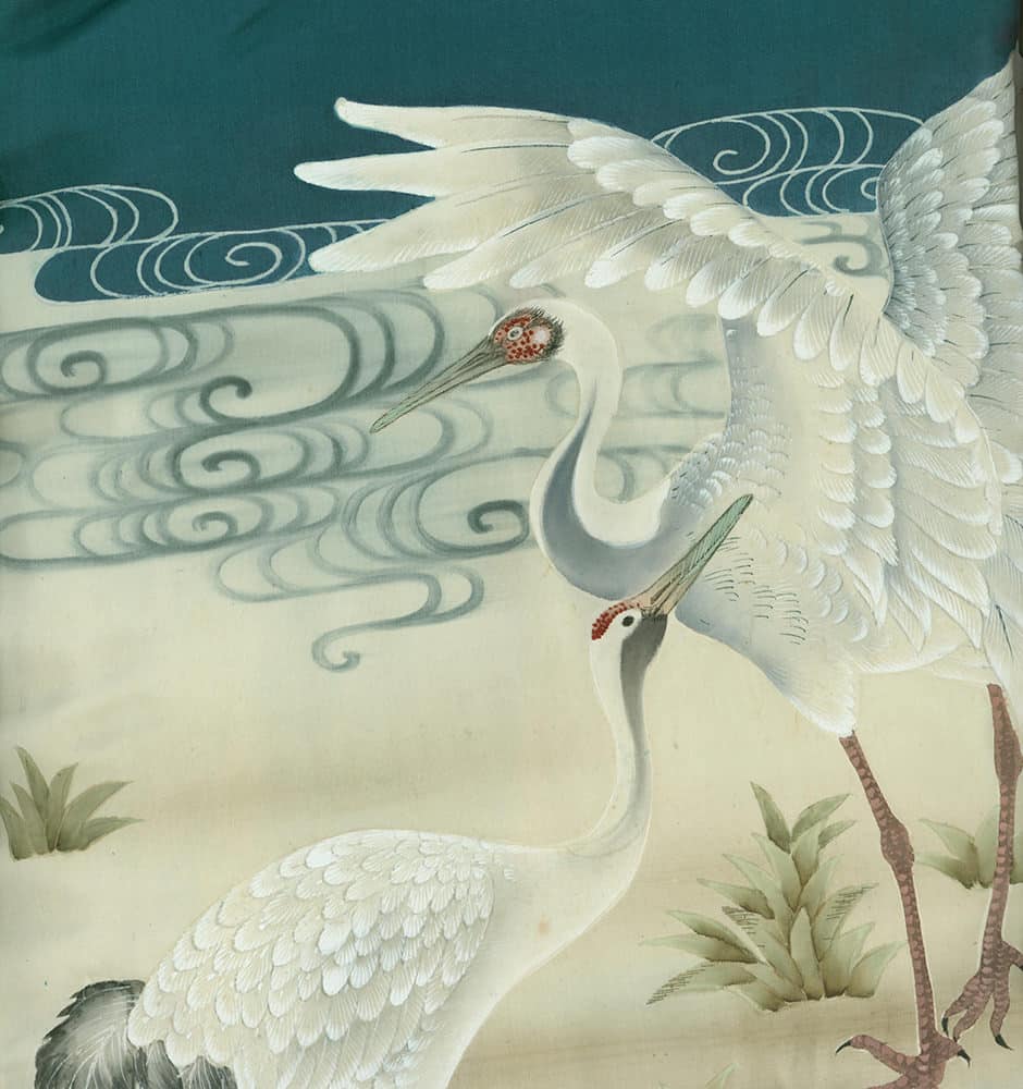 White cranes with elegant wings against swirling background