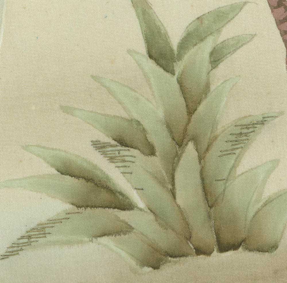 Soft green botanical watercolor of delicate leaves on textured fabric