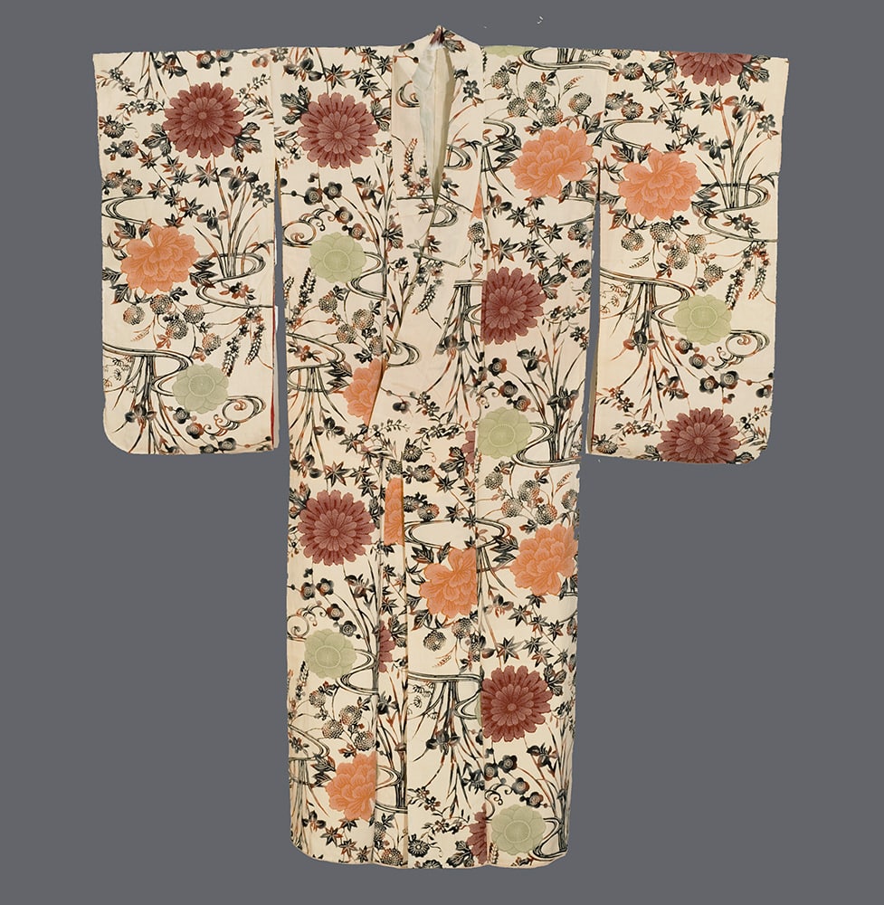 Vintage Japanese kimono with floral pattern in rust and orange tones