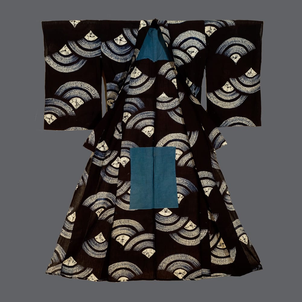 Traditional Japanese kimono with blue and white fan-like pattern