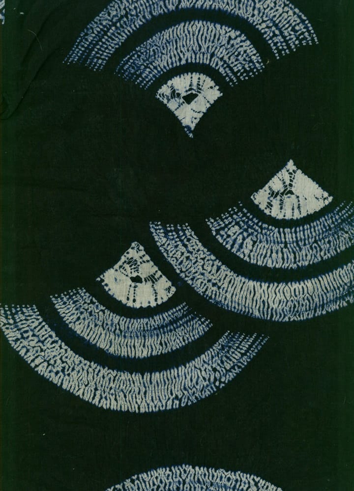 Japanese shibori indigo-dyed fabric with circular geometric patterns