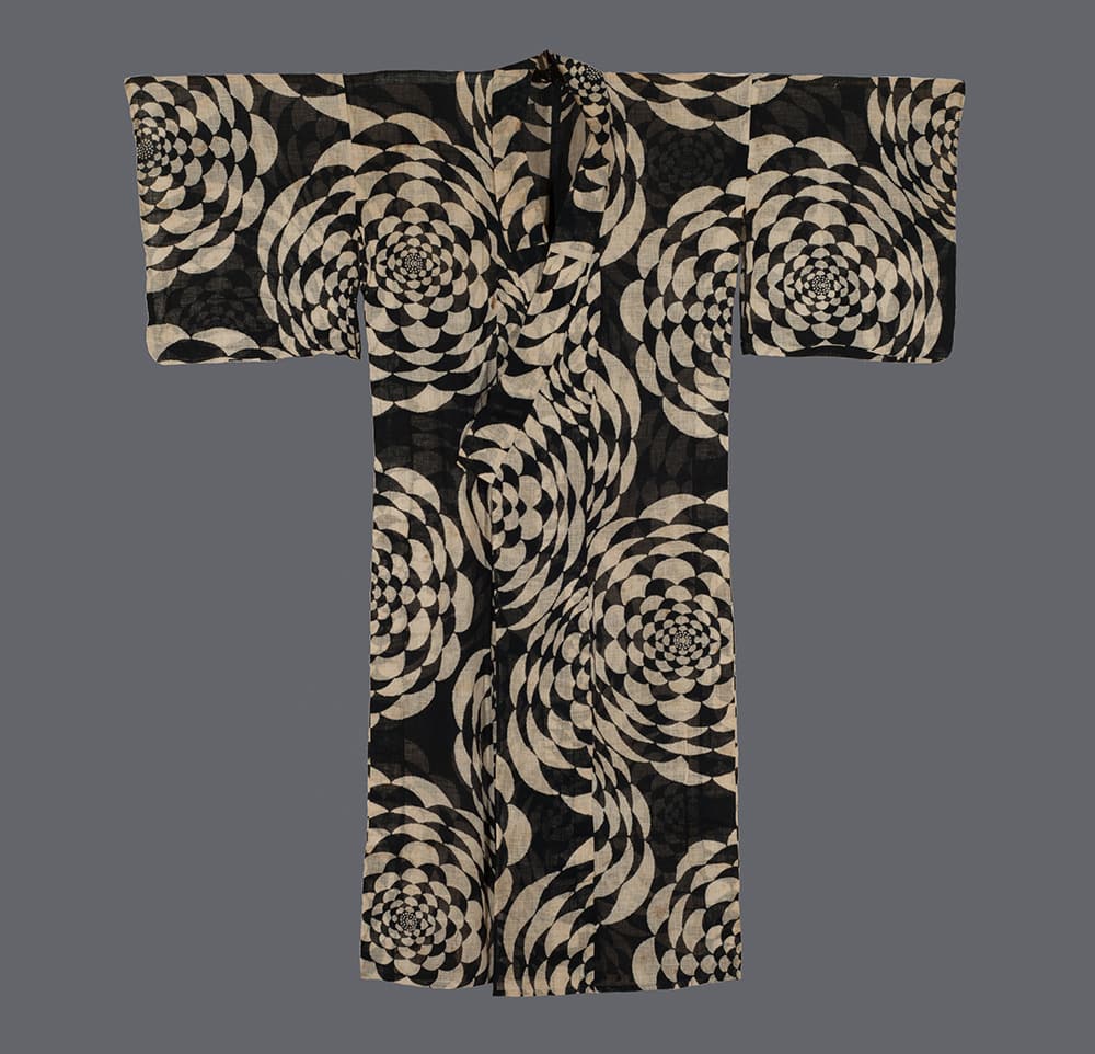 Black and white Japanese kimono with hypnotic spiral floral pattern