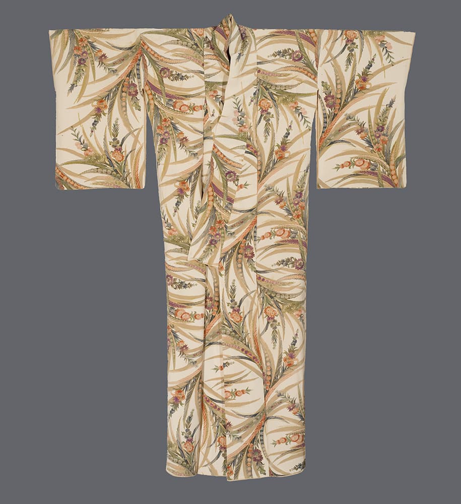 Traditional Japanese kimono with delicate floral and leaf pattern in soft colors