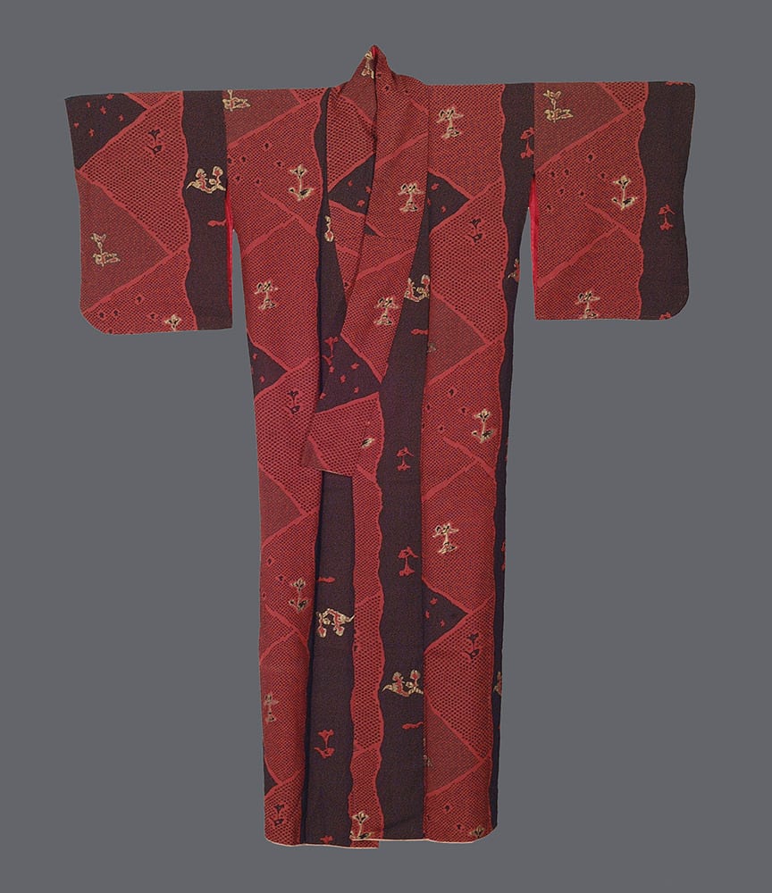 Traditional red and black Japanese kimono with geometric pattern