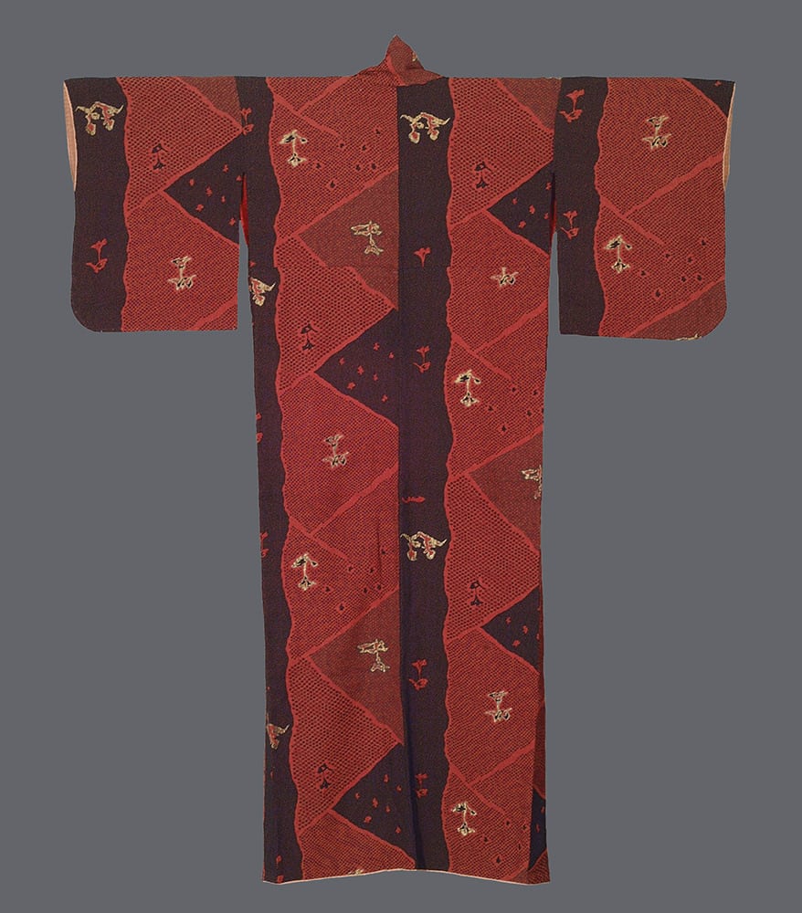 Vintage red and black Japanese kimono with geometric pattern and small motifs