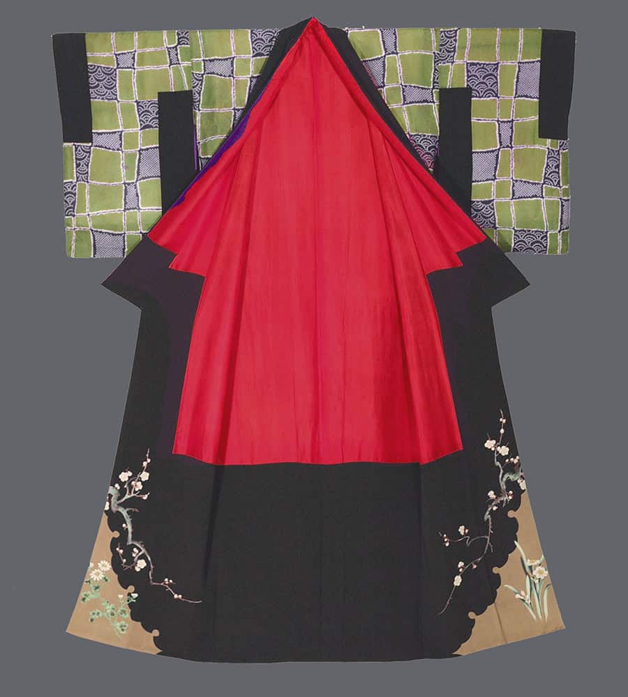Colorful Japanese kimono with red, black, and green geometric patterns