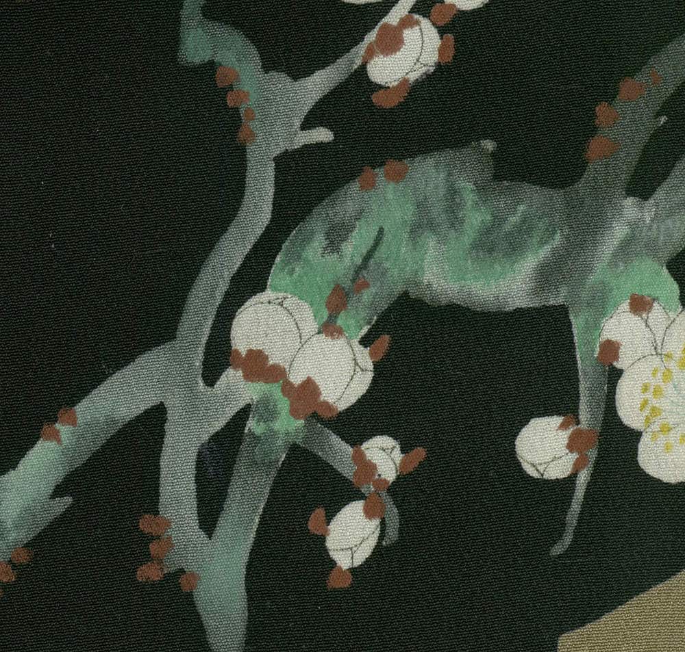 Delicate white and brown blossoms on muted green branches