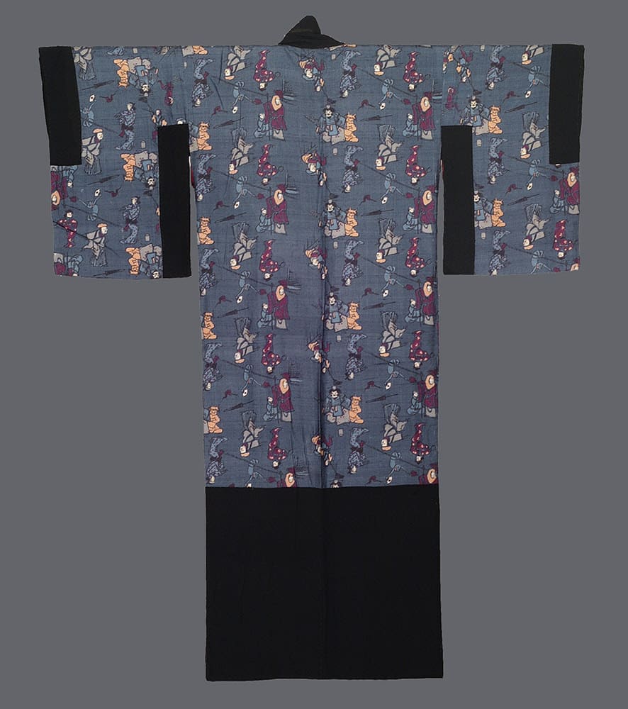 Blue Japanese kimono with playful cartoon characters and figures pattern