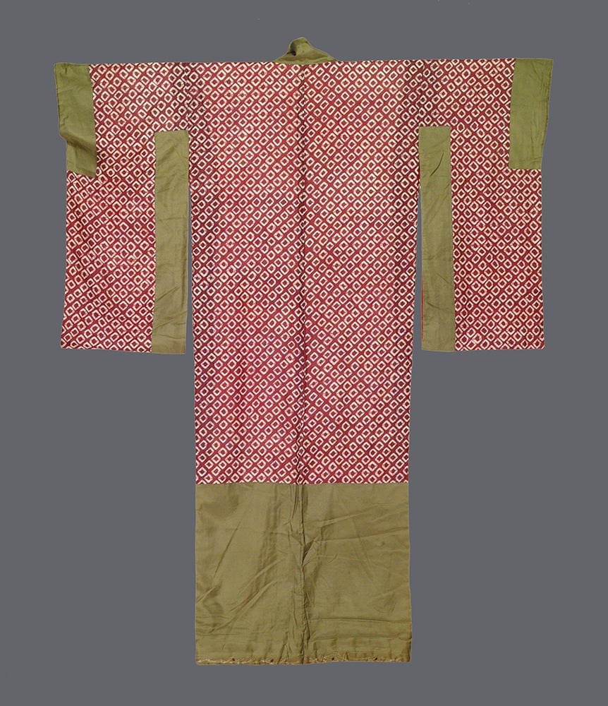 Traditional Japanese kimono with red geometric pattern and olive green panels