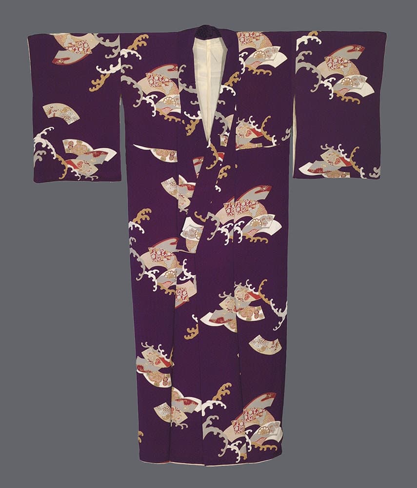 Purple Japanese kimono with decorative fan and wave pattern