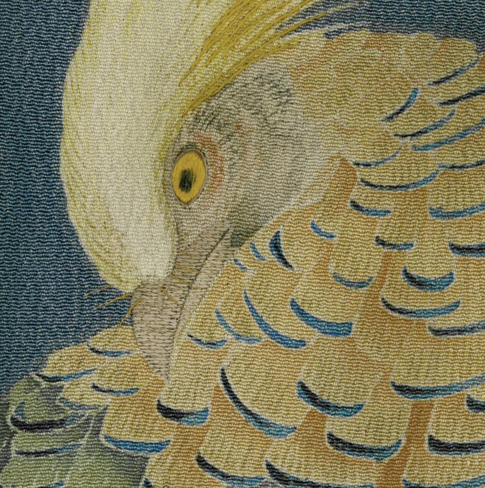 Detailed tapestry of a yellow bird with blue-lined feathers and bright eye